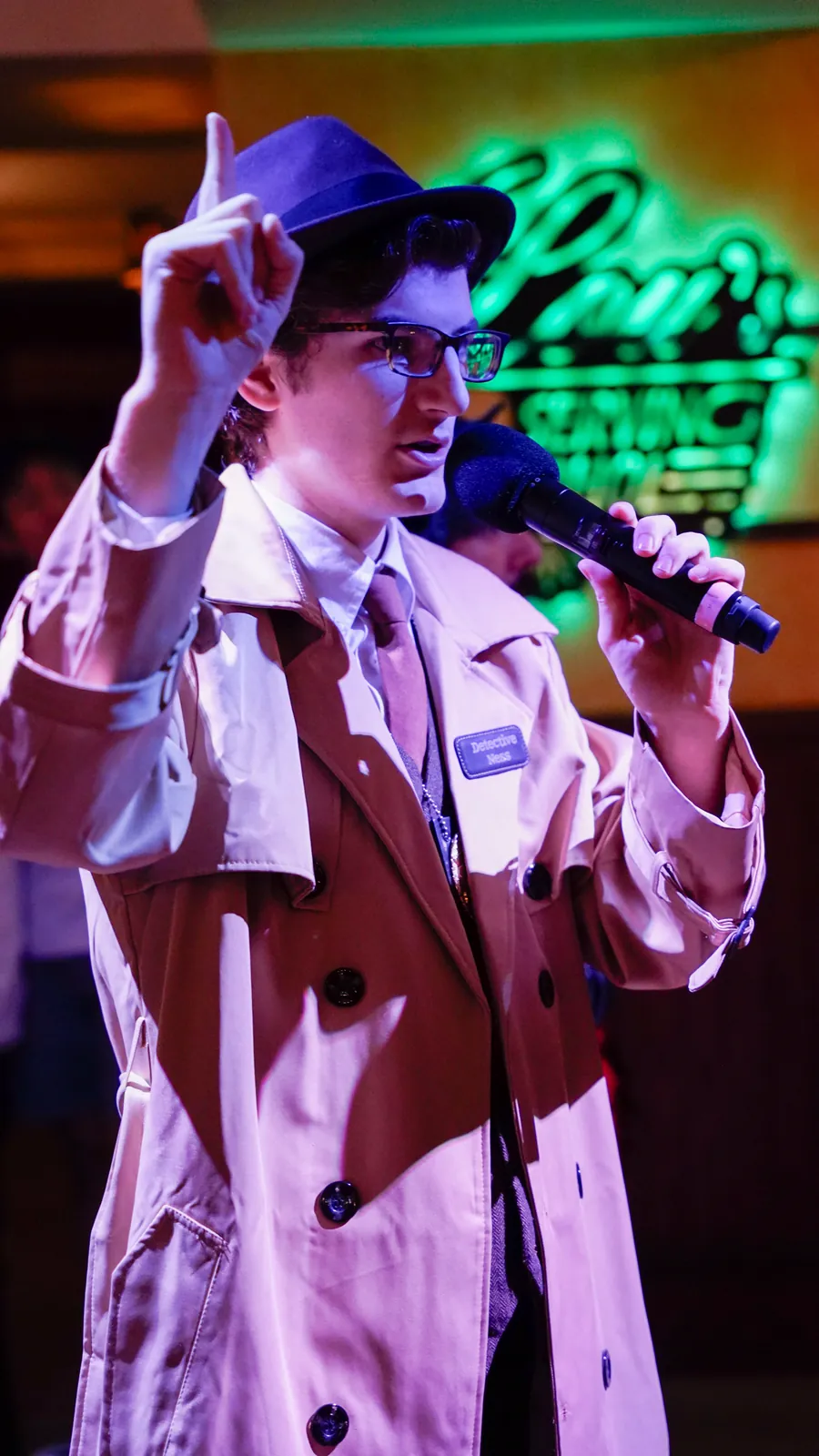 A Murder Mystery Company actor working the room at a Omaha show